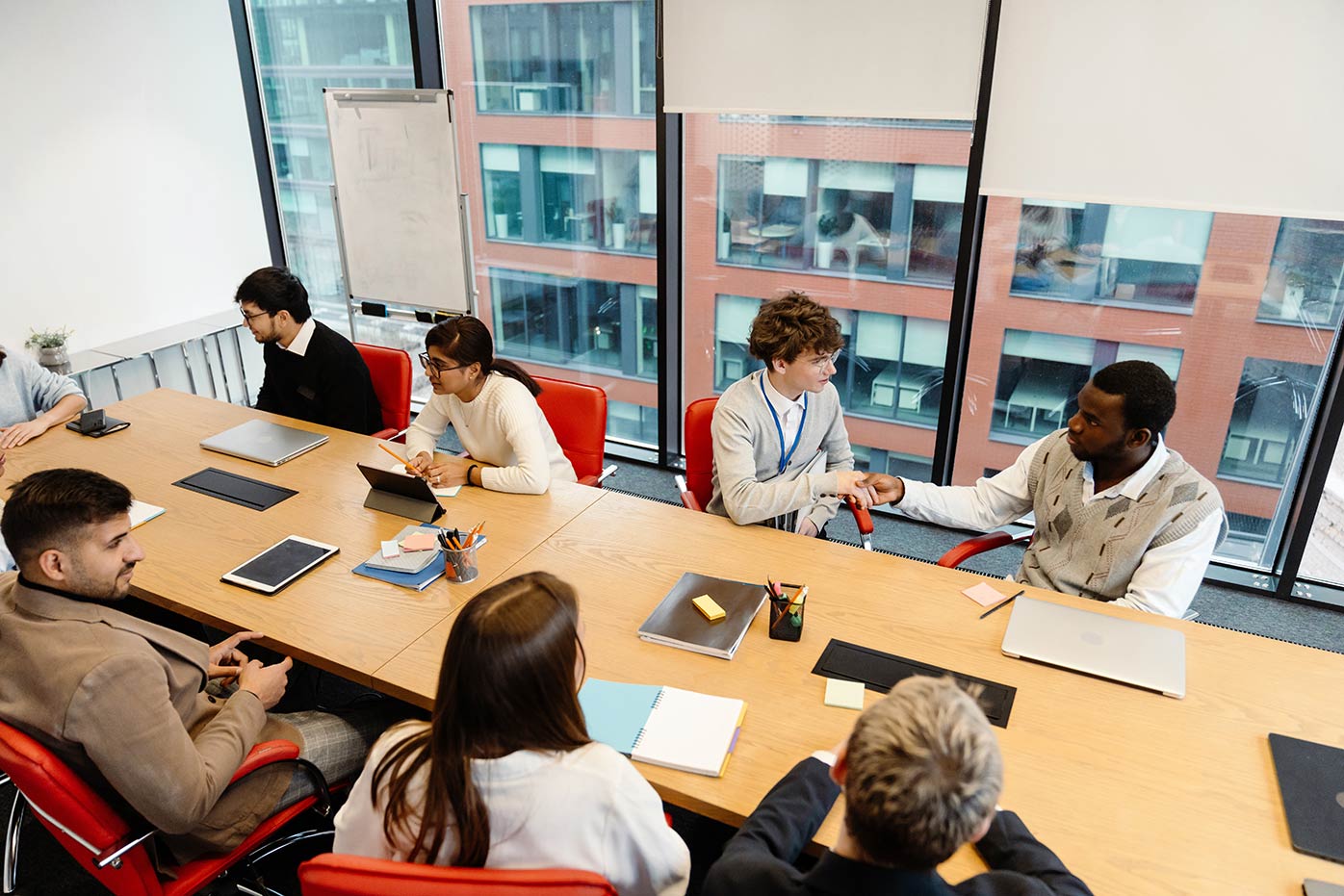 People sitting around a conference table