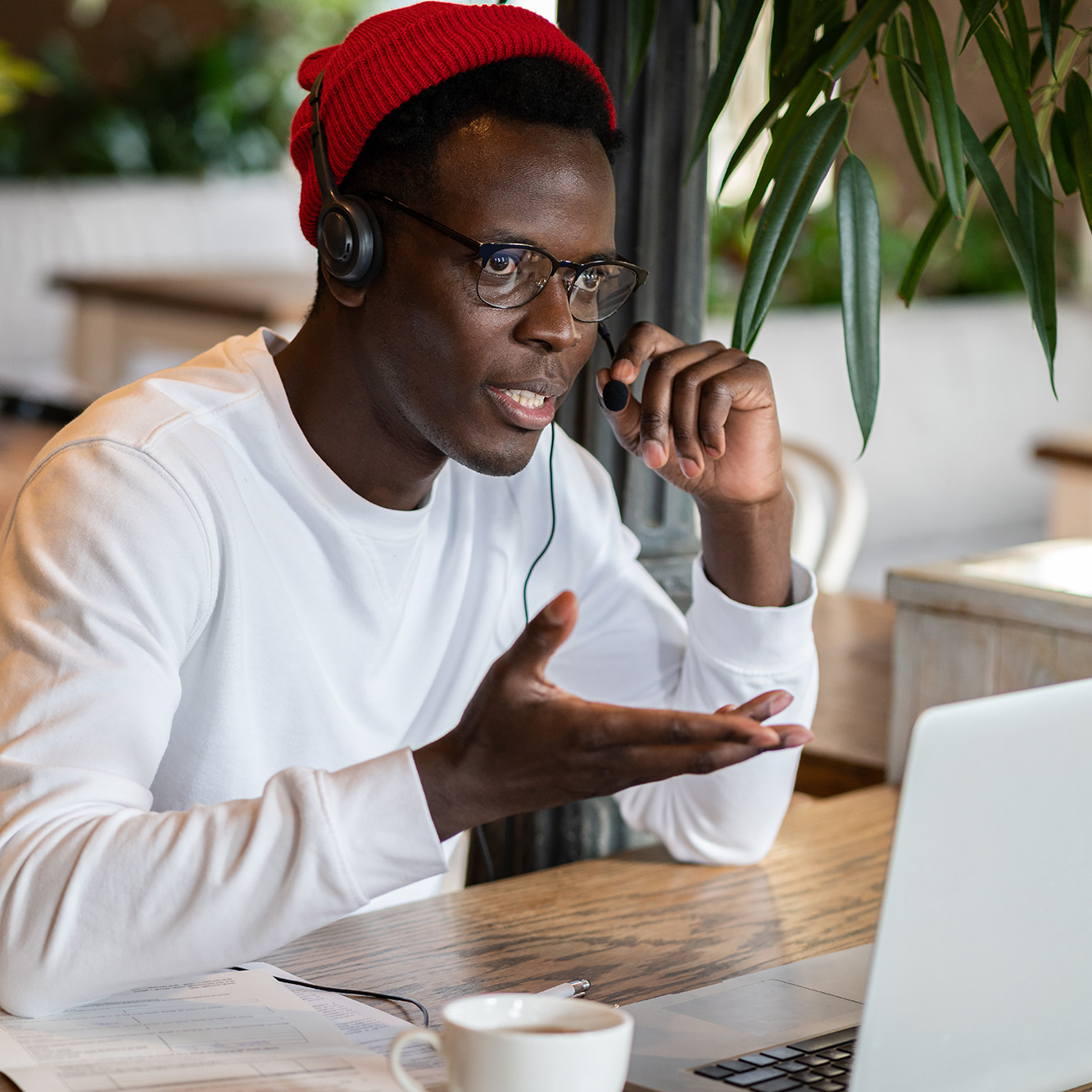 Man on a headset on Zoom