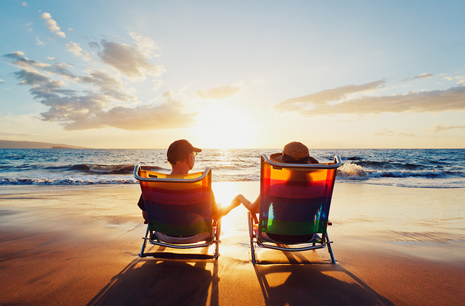 A couple relax at the beach