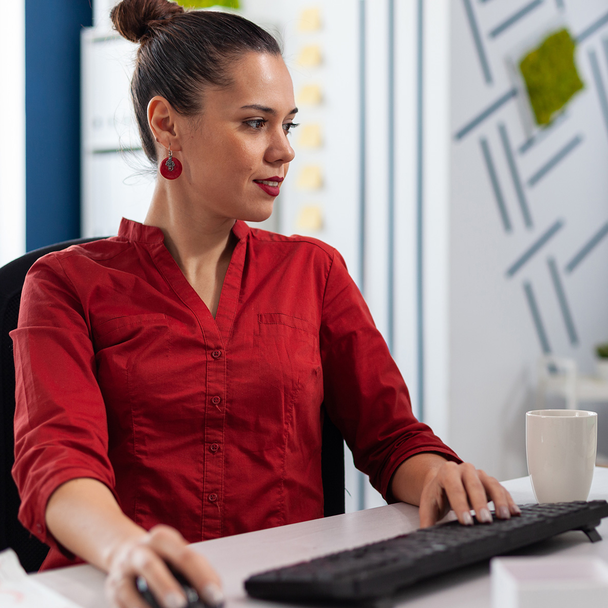 Woman sitting at her computer working